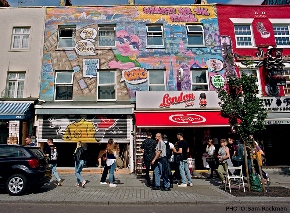 Camden Open Air Gallery painted building front mural by Akit