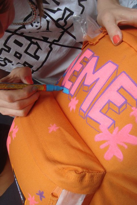 East Pak graffiti workshop participants creating spray paint artwork